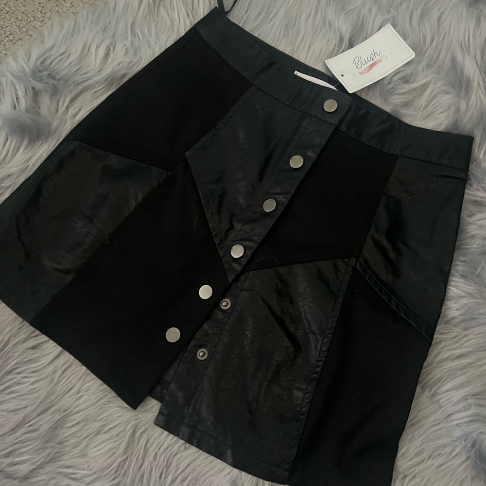 Beautiful leather mini skirt.